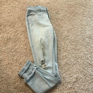 Light Distressed Mid-Rise Jeans